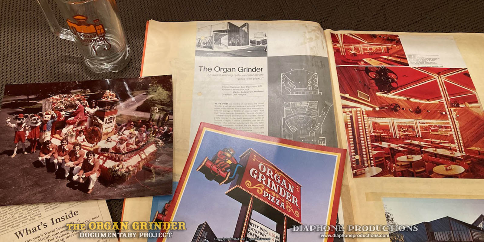 Assorted documents, flyers, articles, and merchandise memorabilia from the Organ Grinder.
